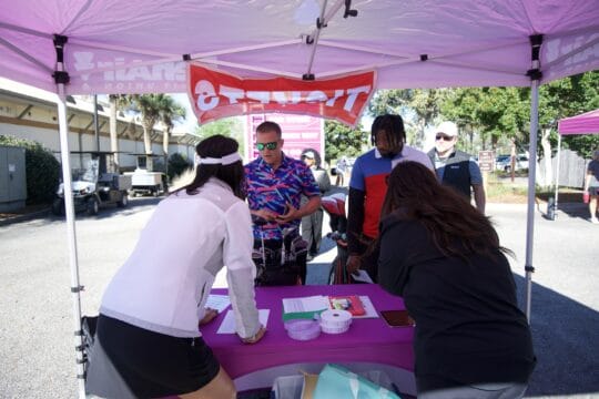 people at registration table