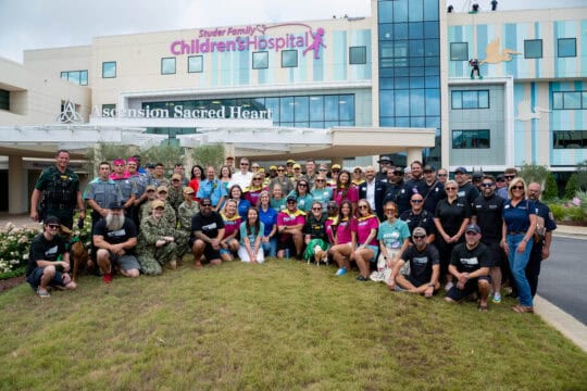 Group in front of hospital