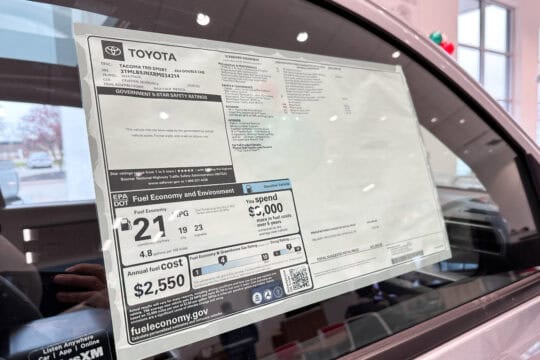 Dealers window sticker MSRP price on a new Toyota Tacoma vehicle.