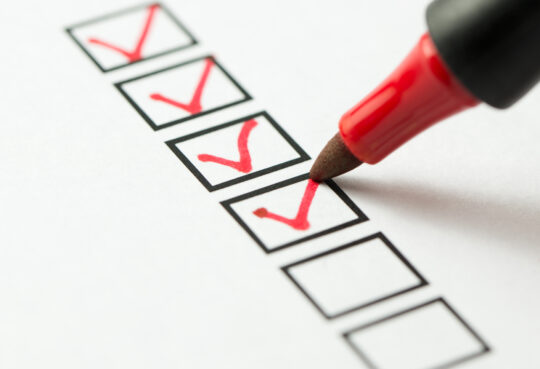 checklist with red ink