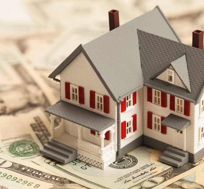 Home sitting on top of cash