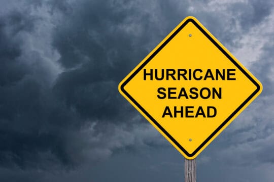 Yellow sign that says Hurricane Season Ahead