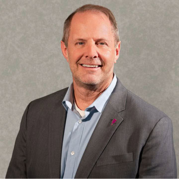 Man in front of grey background