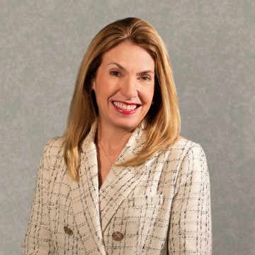 photo of woman in front of grey background